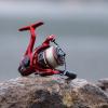 image:imageKastKing Royale Legend Fishing Reel  521621 Gear Ratio Spinning Reel Up to 22 Lbs of Carbon Drag 5171 Stainless Steel Ball Bearings Graphite Frame Asymmetric Spinning Reel Rotor DesignRed 621 Royale Legend Glory